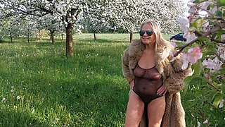 Mature Woman Is Walking Around Outside in a See-through Bodysuit!