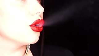 4K Applying crimson lip liner and smoking hookah on black background