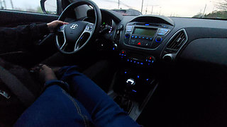 Amateur MILF in jeans and nylon socks gives a taxi driver a footjob