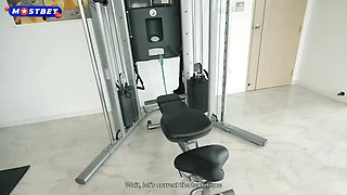 Young beauty shares intense gym trainer passion