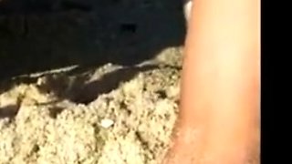 Big-Breasted Girl's Orgasm at the Beach