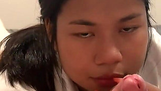 Cute 18 Year Old Thai Student Wearing Uniform Fucked by a Big White Dick and Gets a Huge Facial