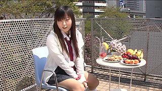 Japanese schoolgirl Ryo Asaka caresses herself in the shower