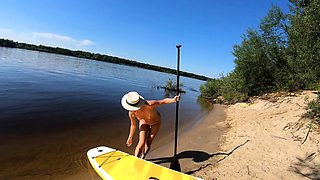 Blonde MILF Plays with Dildo and Gives Blowjob on a SUP Boar