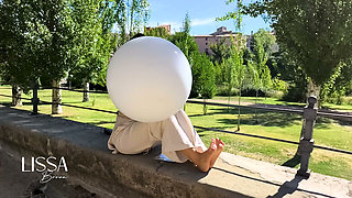 Inflating and Popping Them with Bare Feet Outdoors