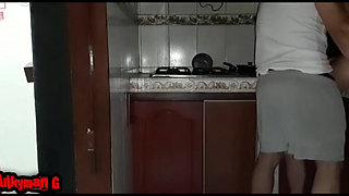 Black Haired Stepmom Maid Fucks Her Stepson and Gives Him a Blowjob in the Kitchen