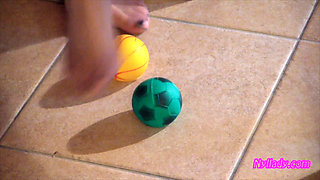 Nyllady Squeezes Rubber Balls Massaging Her Hosed Feet