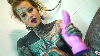 Strongly tattooed model intense ass-fuck jerking off in the shower