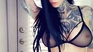 Busty curly brunette with big boobs fucks on couch