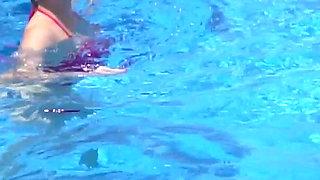 Lesbian Girls Are Having Fun in a Pool with an Inflatable Shark