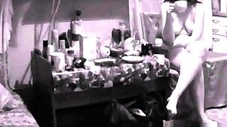 spy cam- naked stepmother puts on make up