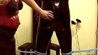 The Slave in Latex - Rough BDSM Action with Three People