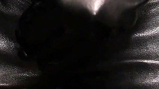 Lady Amber Encases Slave Mila Layers of Leather
