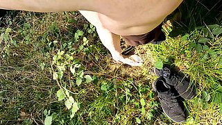 Whipping her vagina in the woods