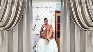 A Mature Ukrainian Woman Shows off Her Figure and Poses for the Camera at Home