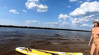 Big-Ass Blonde's Naked Walk on a Paddleboard