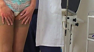 Gyno examination of blonde mature woman