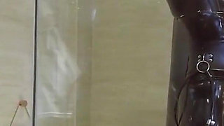 Mz20 - the Girl in Latex Clothing Locked in a Glass Room