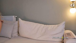 Flexible Blonde Intern Secretly Toys Pussy on Couch