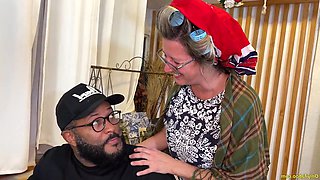 An aged posterior widened by a sizable ebony phallus.