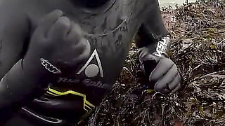 Rubbery Beach Encounter: Lucy's Neoprene Pussy Play with Stranger