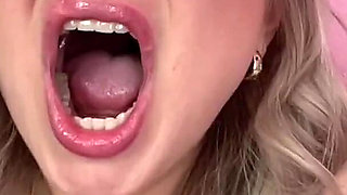 Yawning Blonde with Glasses in Slow Motion