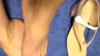 Cute teen girl enjoys foot fetish