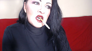 Closeup smoking red glittered lipstick