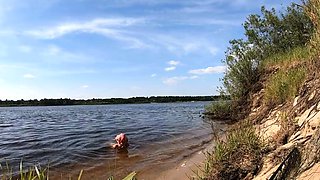 Blonde Solo Girl Cooks Naked by the Campfire