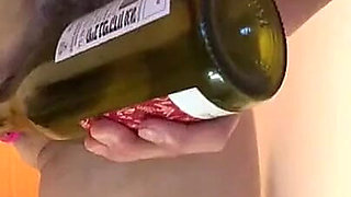 Slim Hairy Pussy MILF Teases with a Bottle of