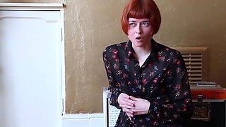 German redhead enjoys voluptuous masturbation while wearing