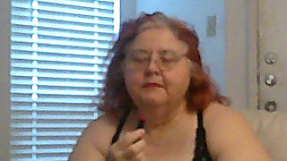 Mature BBW Redhead Nurse Vicki Talks to You as She Makes a Lipstick Applying Video for You!