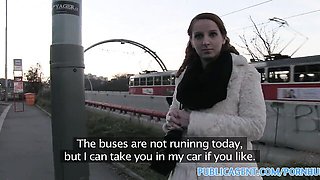 Redhead climbs into a stranger's car