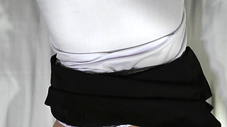 A young Asian student gets fucked by a big white cock in her school uniform