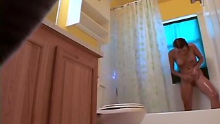 Stepdaughter 21 shaves pussy in shower (voyeur)