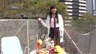 Teen Japanese hottie in a miniskirt and ponytail gets naughty with herself while peeing on the tiles