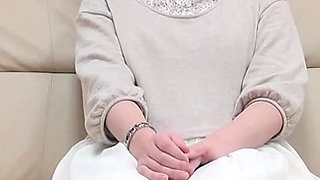 Dark Haired MILF From Asia Playing with a Loaded Pecker