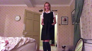 Cute tattooed milf makes solo striptease porn