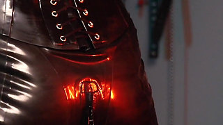 German Latex Slut is Bound and gagged and gets a spanking session