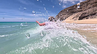 Girl Wetting Jeans in the Ocean and Swimming in Wet White T-shirt