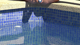 Busty Blonde Masturbating on the Pool