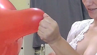 Blow to Pop Big Red Baloon with Nipples Out