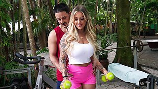 Silicone bitch Kali Roses gets oiled up and banged outdoors