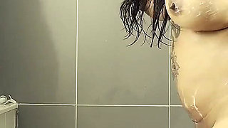 Asian Tattooed MILF Squirts and Masturbates in the Bathroom
