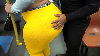 "Masked BBW Teases Huge Ass in Shiny Yellow Leggings on Public Bus"