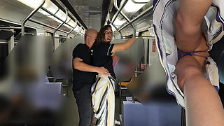 Rubbing himself during the subway ride under her skirt.