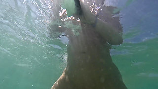 Naughty Blonde Pees in the Ocean Outdoor and Swimming Underwater